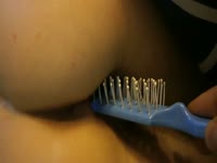 Willing teens boyfriend recorded this insertion video while sliding bristled hairbrush into her cunt